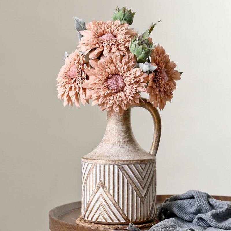 Antique Ceramic Vase with geometric patterns, filled with pink flowers, displayed on a wooden table in a cozy setting. Perfect for the living room decor. Nest Haven Shop, CERAMIC, LIVING ROOM