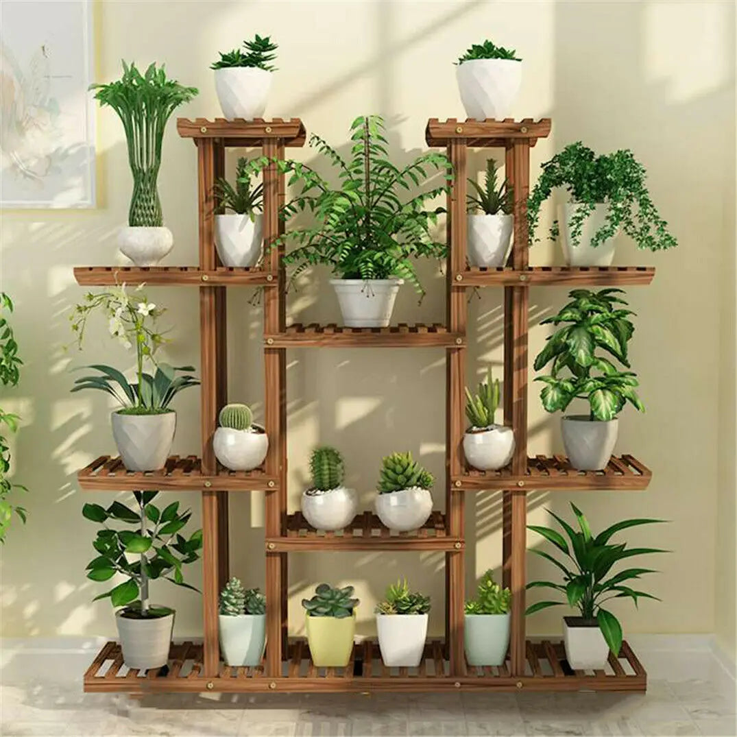 Multi-tier wooden plant stand from Nature's Staircase displaying various lush green plants in white pots. Ideal for enhancing your living room or garden with an eco-friendly, wooden, decorative touch. Nest Haven Shop, WOOD, GARDEN, LIVING ROOM