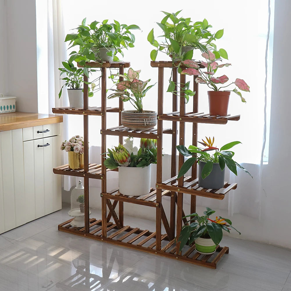 Multi-tier wood plant stand displaying various plants, perfect for transforming any space into a cozy green sanctuary. Ideal for small or large spaces. Nest Haven Shop, WOOD, GARDEN, LIVING ROOM.