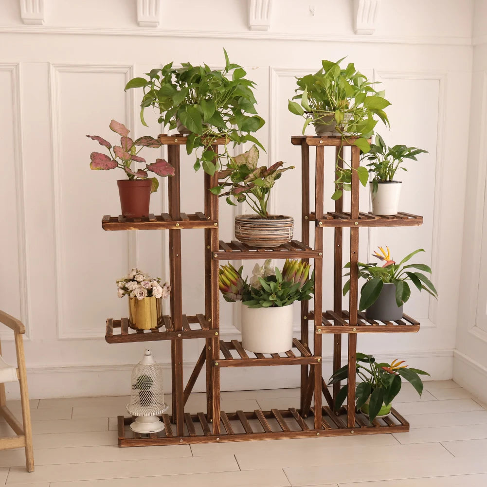 Stunning multi-tier wooden plant stand with various potted plants, perfect for sprucing up your living room or garden. Nest Haven Shop, WOOD, GARDEN, LIVING ROOM