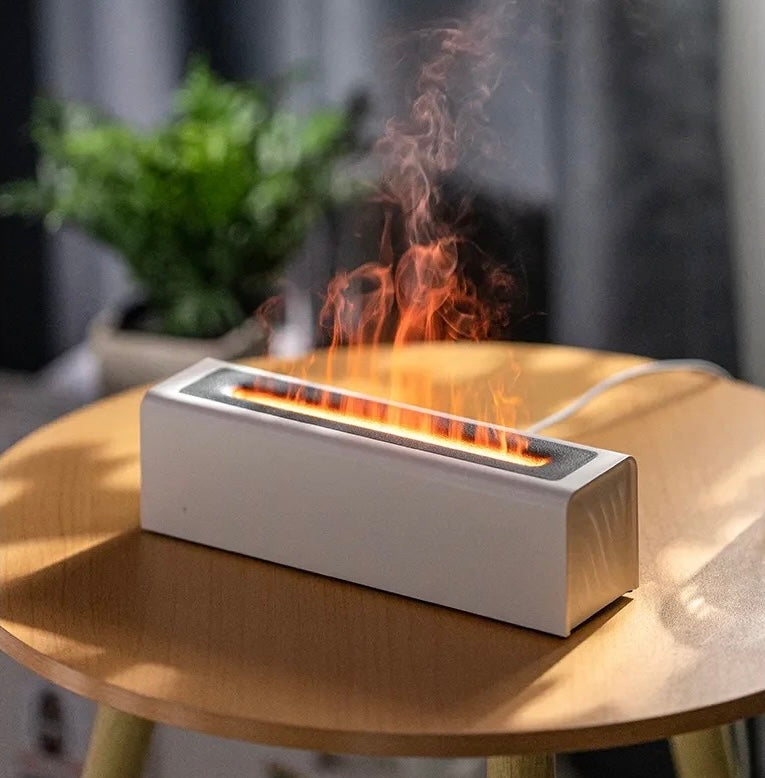 Close-up image of the Fireplace Diffuser on a wooden table, showing its sleek design and brilliant simulation flame feature, perfect for creating a relaxing ambiance in any room. NestHaven Shop, Home page.