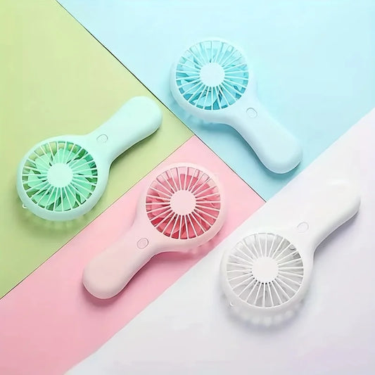 Portable Mini Pocket Fan in pastel colors – your go-to for on-the-move cool, available at Nest Haven Shop, SUMMER