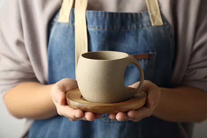 Cozy ceramic coffee cup with wooden saucer, perfect blend of rustic charm and modern elegance, Nest Haven Shop, KITCHEN