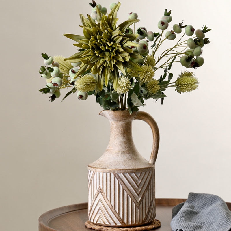 Antique Ceramic Vase filled with gorgeous blooms, adding a sleek, modern touch to a cozy living room space. Nest Haven Shop, CERAMIC, LIVING ROOM