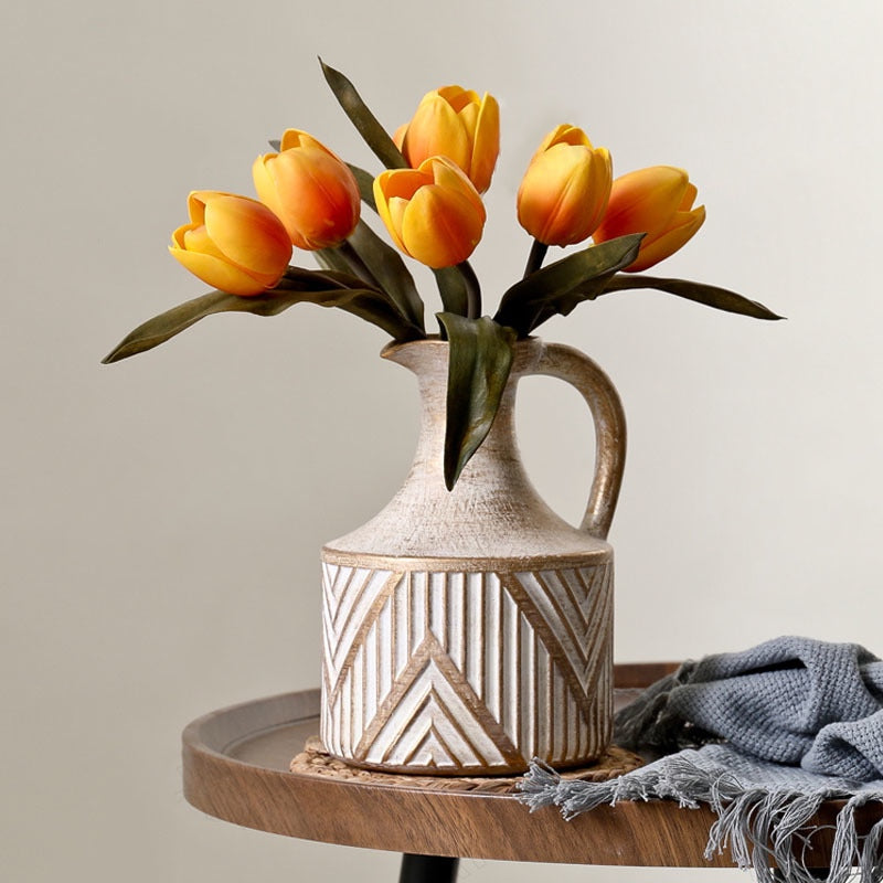 Antique Ceramic Vase on a wooden table with vibrant yellow-orange tulips, perfect for adding a modern touch to your living room decor. Nest Haven Shop, CERAMIC, LIVING ROOM